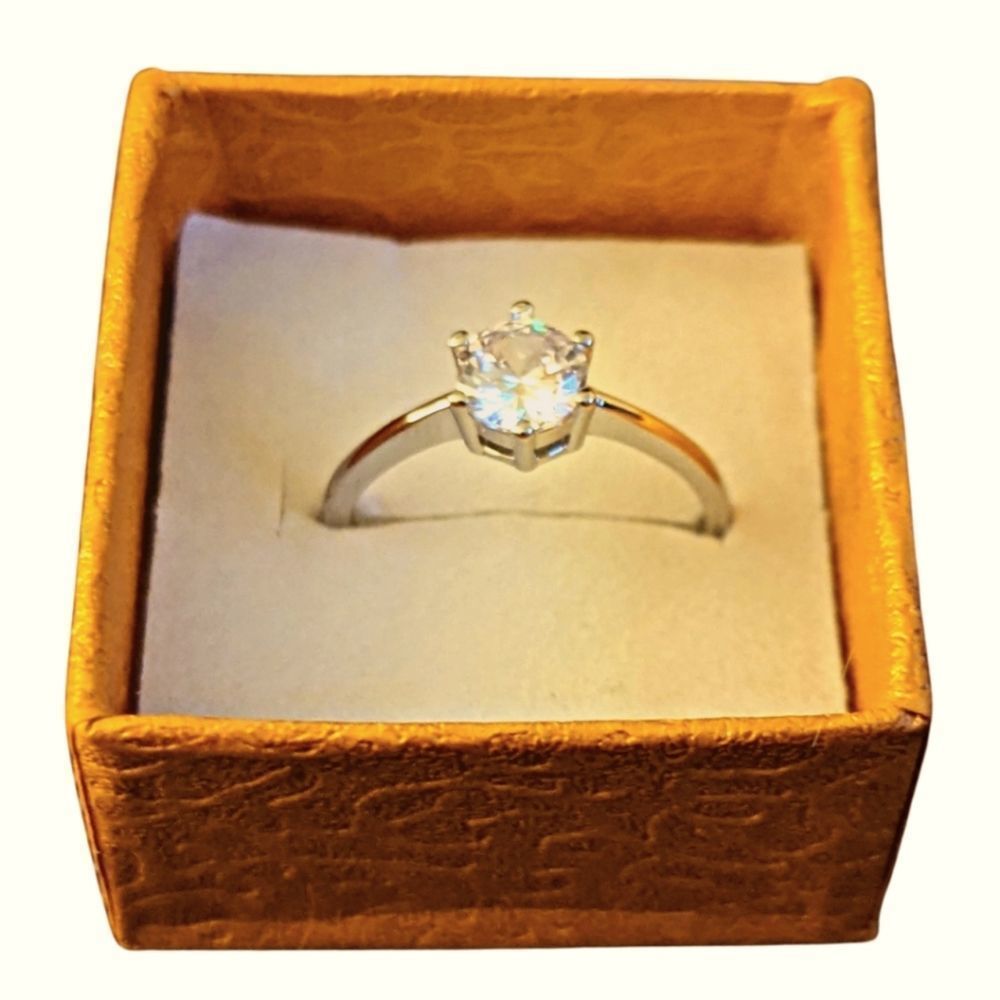 Sterling Silver engagement ring with 2ct. cubic zirconia stone. S925, size 8.